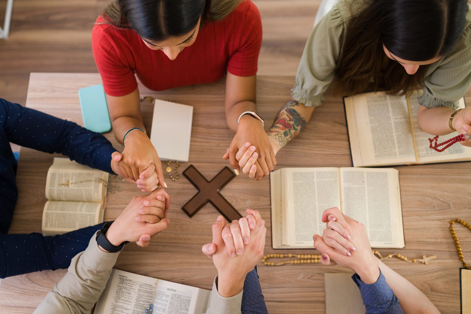 Saying their prayers to God to have more faith